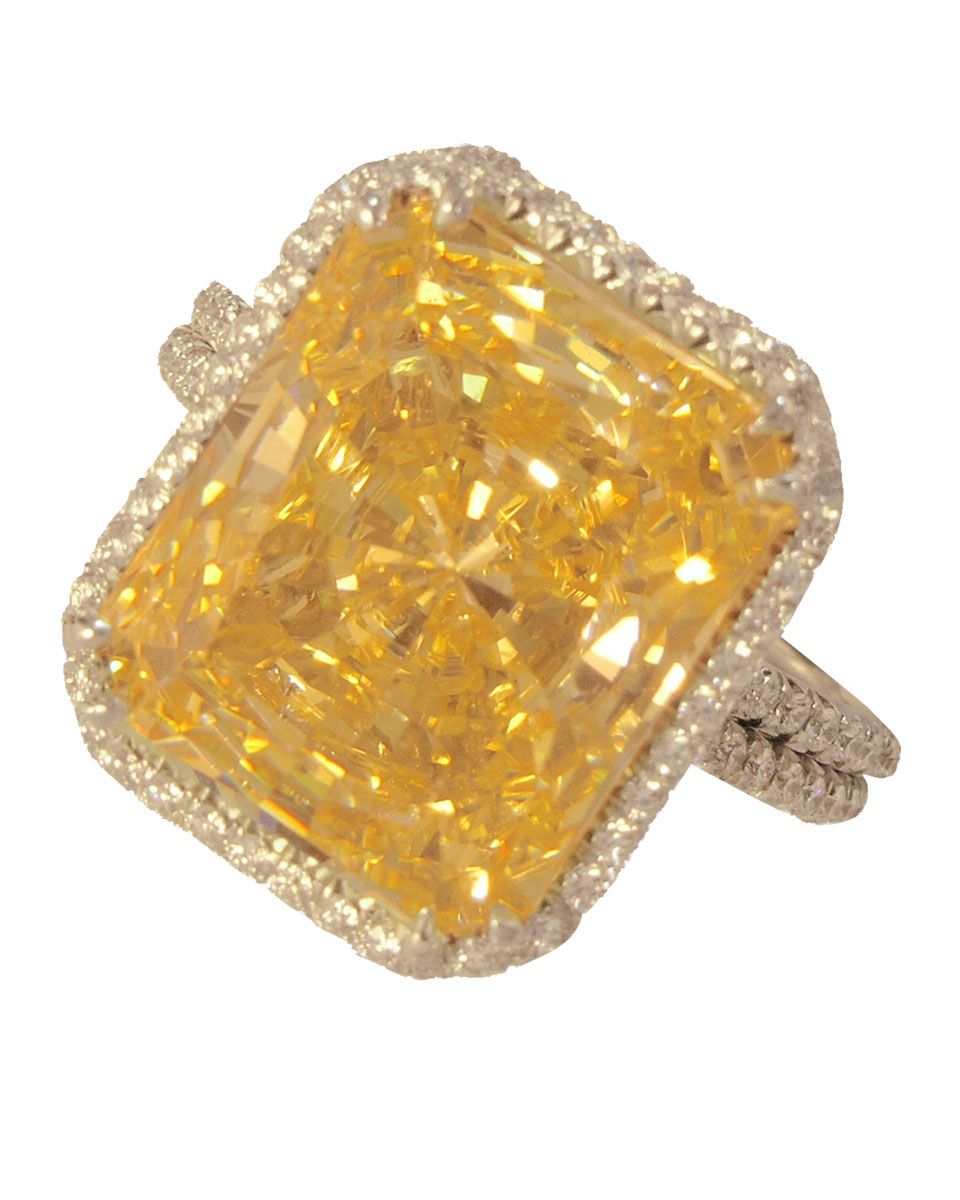 Custom large yellow stone set in pave diamonds, custom jewelry at Clarion Fine Jewelry. Serving Fairfax VA, Washington DC and clients worldwide.